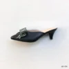 id-11134207-8224o-mkv99exyps007d Crystal Bow Pointed Mule Heels in Black
